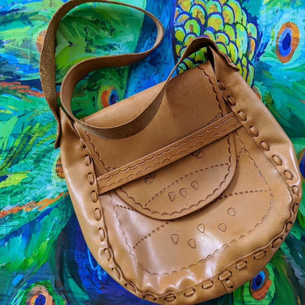 Acorn embossed leather purse